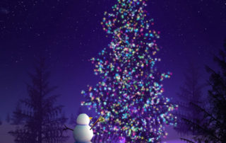 Snowman admires his christmas tree